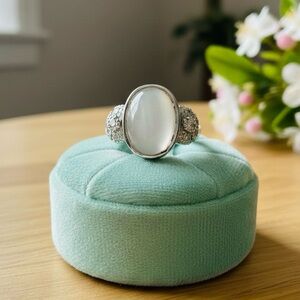 Lustrous Silver Ring with Oval Centerpiece